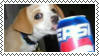 a stamp containing an image of a puppy sipping out of a pepsi can